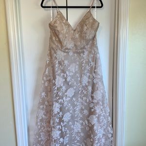 Bridesmaid’s Billowy Pale Blush Floral Overlay